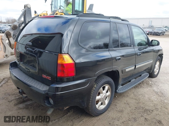 2002 GMC Envoy SLT with VIN 1GKDT13S622506181, listed as a IAAI auction lot 41986061 with 212,583 mi miles. Bid and sale history available at carsss.com. Image 4.