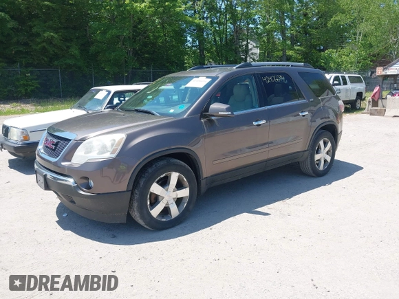2012 GMC Acadia SLT2 z VIN 1GKKVSED0CJ326823, wystawiony jako IAAI lot #42406694 z przebiegiem 173 825 mil mil oraz . Historia ofert i sprzedaży dostępna na DreamBid. Obrazek 2.