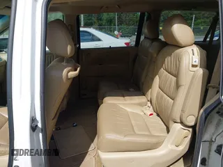 2010 Honda Odyssey EX-L with VIN 5FNRL3H67AB003148, listed as a IAAI auction lot 42244575 with 176,119 mi miles and . Bid and sale history available at DreamBid. Image 8.