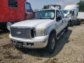 2006 Ford F-350 XL with VIN 1FTWW31P56EC54921, listed as a Copart auction lot 60072945 with 297,681 mi miles and Salvage title. Bid and sale history available at DreamBid. Image 1.