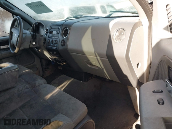 2005 Ford F-150 XLT with VIN 1FTRW12W25KB58736, listed as a IAAI auction lot 41119113 with 218,797 mi miles. Bid and sale history available at carsss.com. Image 5.