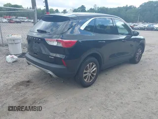 2021 Ford Escape SE with VIN 1FMCU9G60MUA38130, listed as a IAAI auction lot 42763003 with 98,388 mi miles and . Bid and sale history available at DreamBid. Image 4.