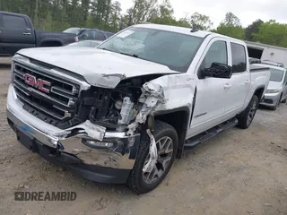 2016 GMC Sierra 1500 SLE z VIN 3GTU2MEC6GG227933, wystawiony jako IAAI lot #42026651 z przebiegiem 185 043 mil mil oraz . Historia ofert i sprzedaży dostępna na DreamBid. Obrazek 2.