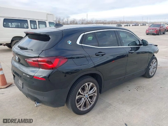 2022 BMW X2 sDrive28i with VIN WBXYH9C09N5U63246, listed as a IAAI auction lot 41573667 with NaN miles. Bid and sale history available at carsss.com. Image 4.