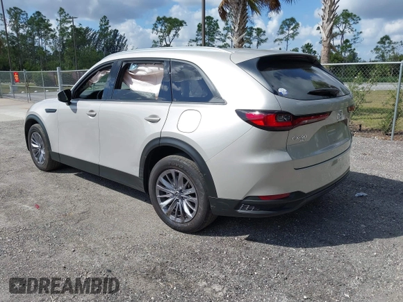 2024 Mazda CX-90 3.3 Turbo Preferred with VIN JM3KKBHD9R1186934, listed as a IAAI auction lot 41806531 with 9,751 mi miles. Bid and sale history available at carsss.com. Image 3.