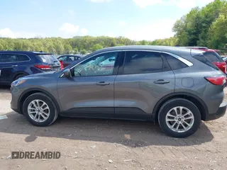 2021 Ford Escape SE Hybrid z VIN 1FMCU0BZ8MUA09021, wystawiony jako IAAI lot #42229018 z przebiegiem 62 265 mil mil oraz . Historia ofert i sprzedaży dostępna na DreamBid. Obrazek 14.