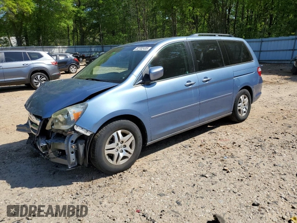 2005 Honda Odyssey EX-L z VIN 5FNRL386X5B034514, wystawiony jako Copart lot #52702435 z przebiegiem 65 988 mil mil oraz Szkoda całkowita • Salvage title. Historia ofert i sprzedaży dostępna na DreamBid. Obrazek 1.