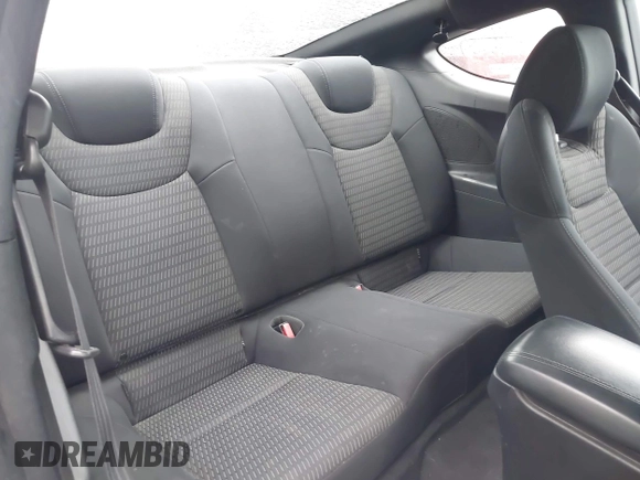 2013 Hyundai Genesis Coupe Premium z VIN KMHHT6KD5DU095906, wystawiony jako IAAI lot #42230462 z przebiegiem 118 279 mil mil oraz . Historia ofert i sprzedaży dostępna na DreamBid. Obrazek 8.
