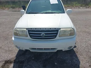 2002 Suzuki XL7 Standard z VIN JS3TY92V624101978, wystawiony jako IAAI lot #42399967 z przebiegiem 179 364 mil mil oraz . Historia ofert i sprzedaży dostępna na DreamBid. Obrazek 12.