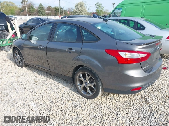 2013 Ford Focus SE with VIN 1FADP3F22DL117712, listed as a IAAI auction lot 42131439 with 124,327 mi miles. Bid and sale history available at carsss.com. Image 3.