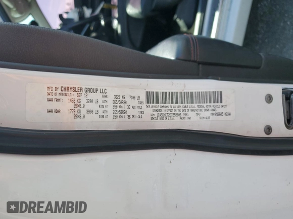 2013 Dodge Durango R/T with VIN 1C4SDHCT2DC559006, listed as a Copart auction lot 49275695 with 117,323 mi miles and Salvage title. Bid and sale history available at DreamBid. Image 16.