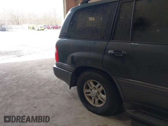 1998 Lexus LX 470 with VIN JT6HT00W3W0001352, listed as a IAAI auction lot 41882901 with 226,917 mi miles and . Bid and sale history available at DreamBid. Image 13.