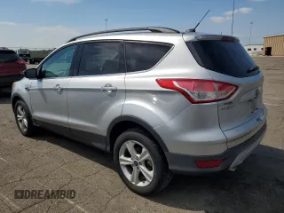 2014 Ford Escape SE with VIN 1FMCU9GX3EUB19987, listed as a Copart auction lot 64042695 with 96,775 mi miles and Salvage title. Bid and sale history available at DreamBid. Image 2.