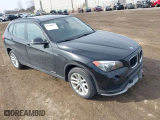 2015 BMW X1 xDrive28i with VIN WBAVL1C5XFVY31542, listed as a IAAI auction lot 41790451 with 66,083 mi miles. Bid and sale history available at carsss.com. Image 1.