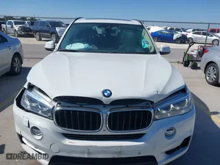 2016 BMW X5 xDrive35i with VIN 5UXKR0C56G0P34365, listed as a IAAI auction lot 41588869 with 105,250 mi miles. Bid and sale history available at carsss.com. Image 6.