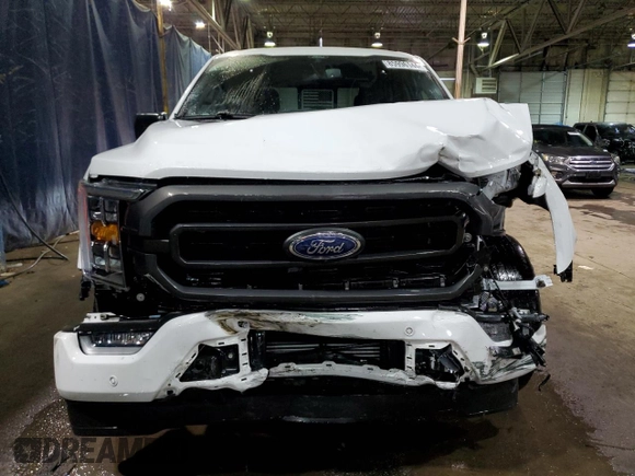 2021 Ford F-150 XL with VIN 1FTFW1E88MFA57935, listed as a Copart auction lot 85996144 with 33,058 mi miles and Salvage Title. Bid and sale history available at carsss.com. Image 5.