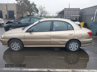 2002 Kia Rio with VIN KNADC123626192611, listed as a IAAI auction lot 41765104 with 62,387 mi miles. Bid and sale history available at carsss.com. Image 14.