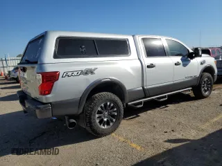 2016 Nissan Titan XD PRO-4X with VIN 1N6BA1F4XGN509643, listed as a Copart auction lot 74530434 with 83,734 mi miles and Clean Title. Bid and sale history available at carsss.com. Image 3.