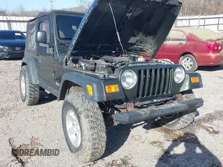 2006 Jeep Wrangler Rubicon z VIN 1J4FA69SX6P788424, wystawiony jako IAAI lot #41712349 z przebiegiem 121 684 mil mil oraz . Historia ofert i sprzedaży dostępna na DreamBid. Obrazek 12.