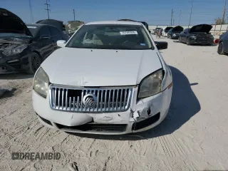 2006 Mercury Milan с VIN 3MEFM07146R600606, выставлен на аукционе Copart как лот 76766344 с пробегом 75 408 миль миль и Списание • Salvage title. История ставок и продаж доступна на DreamBid. Изображение 5.