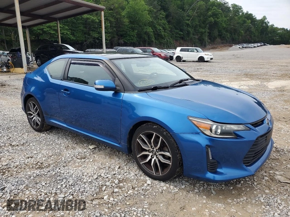 2014 Scion tC z VIN JTKJF5C76E3087992, wystawiony jako Copart lot #56058445 z przebiegiem 84 387 mil mil oraz Czysty tytuł • Clean title. Historia ofert i sprzedaży dostępna na DreamBid. Obrazek 4.
