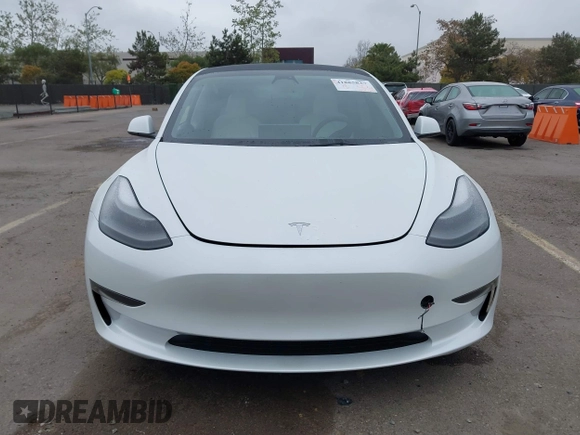 2023 Tesla Model 3 with VIN 5YJ3E1EA5PF505856, listed as a IAAI auction lot 41885837 with 28,206 mi miles and . Bid and sale history available at carsss.com. Image 11.