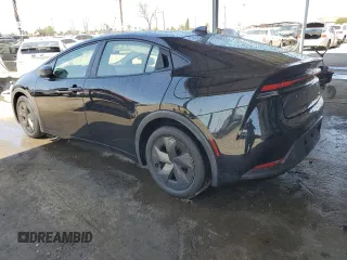 2024 Toyota Prius LE z VIN JTDACAAU0R3017895, wystawiony jako Copart lot #51476875 z przebiegiem 25 826 mil mil oraz Szkoda całkowita • Salvage title. Historia ofert i sprzedaży dostępna na DreamBid. Obrazek 2.