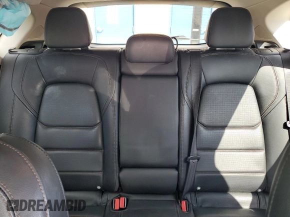 2019 Mazda CX-5 Grand Touring with VIN JM3KFADM2K1657915, listed as a Copart auction lot 56647145 with 85,095 mi miles and Salvage title. Bid and sale history available at DreamBid. Image 10.
