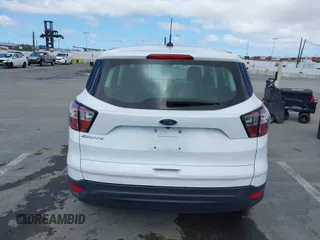 2018 Ford Escape S z VIN 1FMCU0F78JUA56974, wystawiony jako IAAI lot #42232294 z przebiegiem 63 511 mil mil oraz . Historia ofert i sprzedaży dostępna na DreamBid. Obrazek 16.