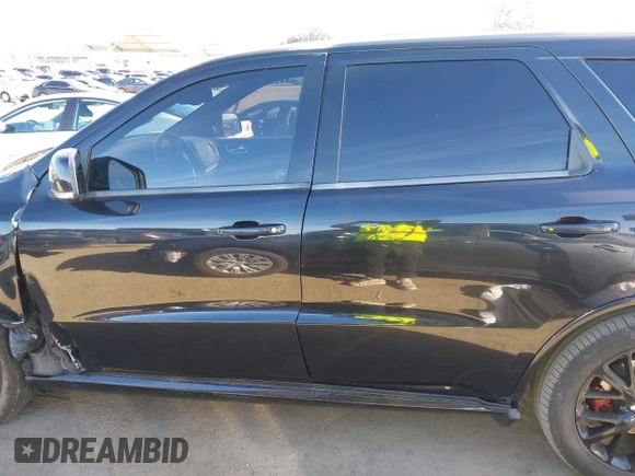 2015 Dodge Durango R/T with VIN 1C4SDHCT5FC937676, listed as a IAAI auction lot 41369508 with 107,075 mi miles and . Bid and sale history available at DreamBid. Image 14.