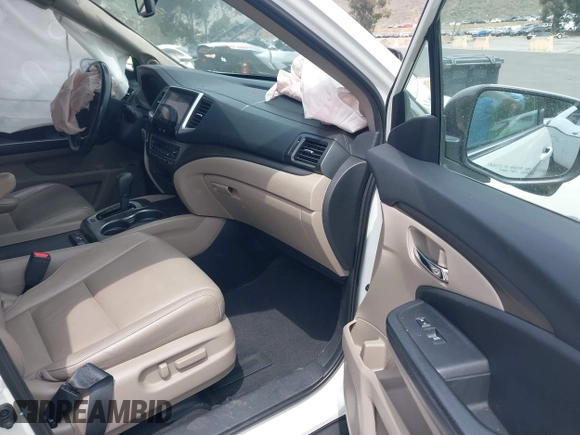 2016 Honda Pilot EX-L with VIN 5FNYF5H55GB015166, listed as a IAAI auction lot 42003009 with 142,488 mi miles and . Bid and sale history available at DreamBid. Image 5.