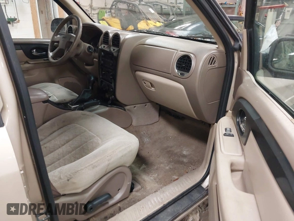 2004 GMC Envoy SLT with VIN 1GKET16S746148679, listed as a IAAI auction lot 41602991 with 196,621 mi miles and . Bid and sale history available at DreamBid. Image 5.