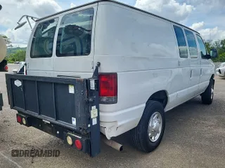 2013 Ford Econoline Cargo Commercial z VIN 1FTNE2EL1DDA51737, wystawiony jako IAAI lot #42621043 z przebiegiem 153 828 mil mil oraz . Historia ofert i sprzedaży dostępna na DreamBid. Obrazek 1.