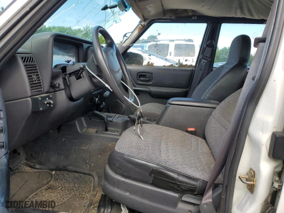 2001 Jeep Cherokee Sport with VIN 1J4FF48S21L608893, listed as a Copart auction lot 61865484 with 172,440 mi miles and Non Repairable. Bid and sale history available at carsss.com. Image 7.