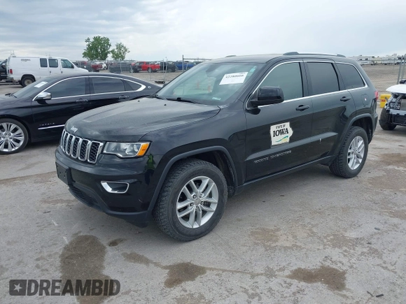 2018 Jeep Grand Cherokee Laredo E with VIN 1C4RJFAG6JC335606, listed as a IAAI auction lot 42280666 with 113,438 mi miles and . Bid and sale history available at DreamBid. Image 2.