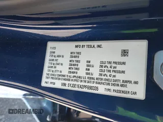 2023 Tesla Model 3 with VIN 5YJ3E1EA2PF690335, listed as a IAAI auction lot 41732701 with 22,238 mi miles and . Bid and sale history available at DreamBid. Image 9.