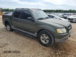 2001 Ford Explorer Sport Trac with VIN 1FMZU67E61UC73126, listed as a Copart auction lot 58207385 with 163,915 mi miles and Salvage title. Bid and sale history available at DreamBid. Image 4.