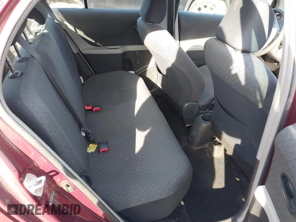 2009 Toyota Yaris with VIN JTDKT903X95258654, listed as a IAAI auction lot 41759756 with 93,810 mi miles. Bid and sale history available at carsss.com. Image 8.