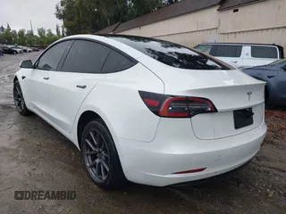 2023 Tesla Model 3 with VIN 5YJ3E1EA3PF401446, listed as a IAAI auction lot 41565881 with Not Provided miles and . Bid and sale history available at carsss.com. Image 3.