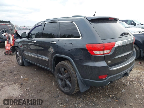 2012 Jeep Grand Cherokee Overland with VIN 1C4RJECT7CC334116, listed as a IAAI auction lot 40968071 with 98,794 mi miles. Bid and sale history available at carsss.com. Image 3.