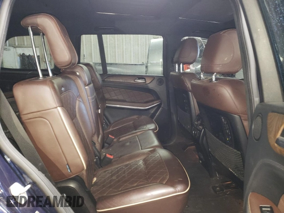 2014 Mercedes-Benz GL 450 z VIN 4JGDF7CE9EA345301, wystawiony jako Copart lot #49129005 z przebiegiem 120 981 mil mil oraz Szkoda całkowita • Salvage title. Historia ofert i sprzedaży dostępna na DreamBid. Obrazek 10.
