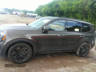 2021 Kia Telluride EX with VIN 5XYP3DHC1MG128114, listed as a IAAI auction lot 42699570 with 92,775 mi miles and . Bid and sale history available at DreamBid. Image 13.