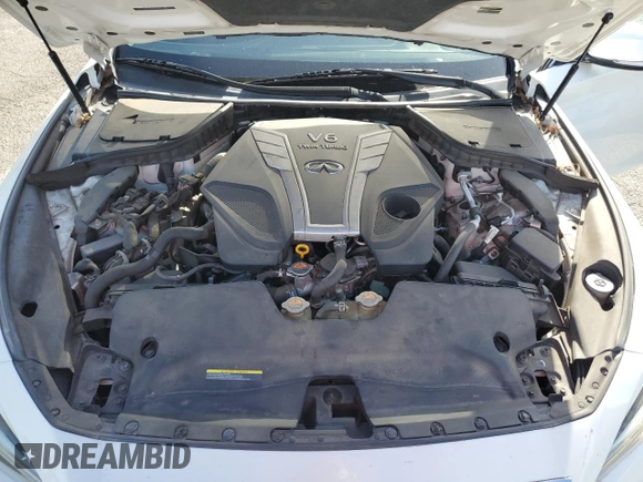 2018 Infiniti Q50 Luxe z VIN JN1EV7AP5JM352628, wystawiony jako Copart lot #51612595 z przebiegiem 93 801 mil mil oraz Szkoda całkowita • Salvage title. Historia ofert i sprzedaży dostępna na DreamBid. Obrazek 13.