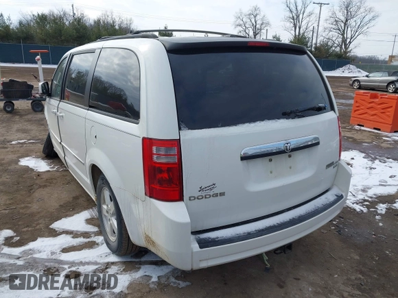 2010 Dodge Grand Caravan SXT with VIN 2D4RN5D18AR218903, listed as a IAAI auction lot 41560484 with Not Provided miles and . Bid and sale history available at DreamBid. Image 3.