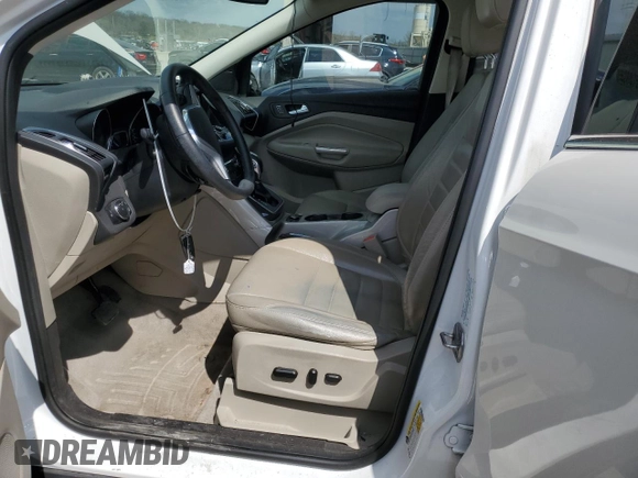 2013 Ford Escape SEL with VIN 1FMCU9H9XDUB08144, listed as a Copart auction lot 52887545 with 142,451 mi miles and Salvage Title. Bid and sale history available at DreamBid. Image 7.