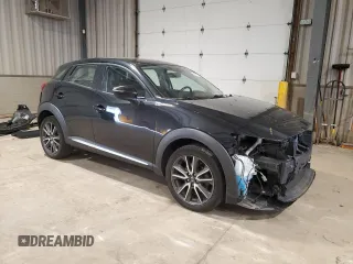 2017 Mazda CX-3 Grand Touring z VIN JM1DKFD71H0141595, wystawiony jako Copart lot #54377305 z przebiegiem 60 907 mil mil oraz Szkody całkowita. Historia ofert i sprzedaży dostępna na DreamBid. Obrazek 4.