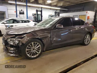 2015 Infiniti Q50 Premium with VIN JN1BV7ARXFM418179, listed as a Copart auction lot 84682284 with 114,143 mi miles and Salvage Title. Bid and sale history available at carsss.com. Image 1.