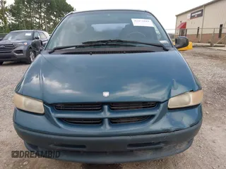 2000 Dodge Caravan with VIN 2B4FP25B8YR708751, listed as a IAAI auction lot 42471041 with 200,820 mi miles and . Bid and sale history available at DreamBid. Image 6.