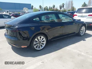 2019 Tesla Model 3 Long Range with VIN 5YJ3E1EB6KF192477, listed as a IAAI auction lot 41981600 with 62,888 mi miles. Bid and sale history available at carsss.com. Image 4.