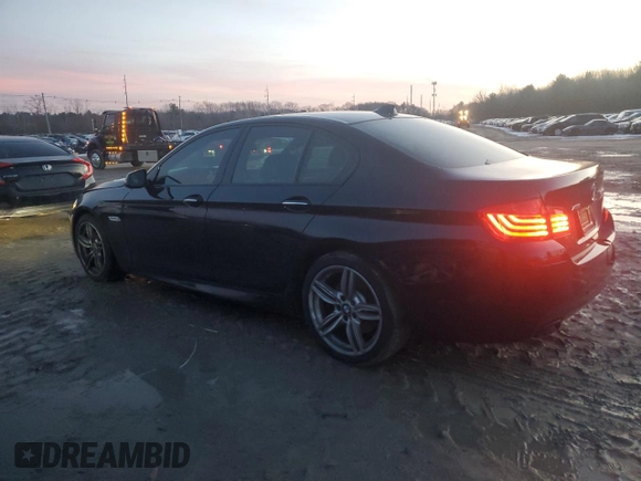 2016 BMW 5 Series 550i xDrive with VIN WBAKP9C52GD981190, listed as a Copart auction lot 85248244 with 90,962 mi miles and Salvage title. Bid and sale history available at DreamBid. Image 2.